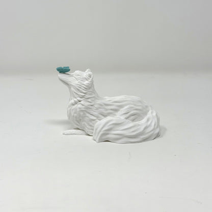 Arctic Fox with Butterfly